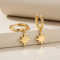 14k Yellow Gold Huggie Style Hoop Earrings with Star Drops by Avera Group