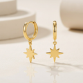 14k Yellow Gold Huggie Style Hoop Earrings with Star Drops by Avera Group
