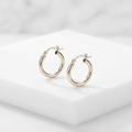 Sterling Silver Polished Hoop Style Earrings with Rhodium Plating (15mm) by Avera Group