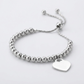 Adjustable Shiny Bead Bracelet with Heart Charm in Sterling Silver by Avera Group