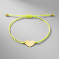9 1/4 inch Yellow Cord Adjustable Bracelet with 14k yellow Gold Heart by Avera Group