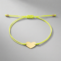 9 1/4 inch Yellow Cord Adjustable Bracelet with 14k yellow Gold Heart by Avera Group
