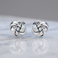 Petite Sterling Silver Polished Love Knot Earrings by Avera Group