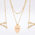 Avera Double Chain Love Necklace In Polished Gold Finish by Avera Group