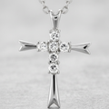 Avera Coupled Cross Pendant In Polished Silver by Avera Group