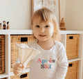 long sleeve graphic bodysuit | apres ski by Finn + Emma