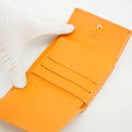 Louis Vuitton Orange Epi Leather Elise Wallet #3825 by Bolt Boutique