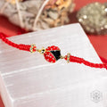 Lucky Ladybug - Four-Strand Red String Bracelet by Conscious Items