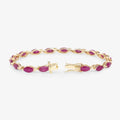 Marquise Pink Ruby Prong 10K Yellow Gold Tennis Bracelet by Fine Color Jewels