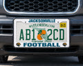 Jacksonville Jaguars License Plate Frame White Plastic 12x6 Inch Officially Licensed