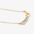 0.30 Ct Round Blue Topaz Prong 18K Gold Plated Silver Heart & Infinity Necklace by Fine Color Jewels