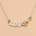 0.30 Ct Round Blue Topaz Prong 18K Gold Plated Silver Heart & Infinity Necklace by Fine Color Jewels