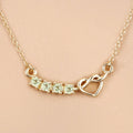 0.28 Ct Round Green Peridot Prong 18K Gold Plated Silver Heart & Infinity Necklace by Fine Color Jewels