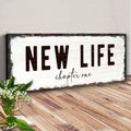 New Life Chapter One Sign by Tailored Canvases