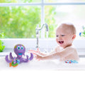 Nuby Floating Purple Octopus with 3 Hoopla Rings Interactive Bath Toy by DailySale