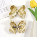 CÉLLOT 4.5" Shining Gold Hair Bows Alligator Clips 2 Pack by Deal US