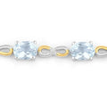 Oval Blue Aquamarine Prong Two-Tone Gold Plated Silver Infinity Bolo Adjustable Bracelet by Fine Color Jewels