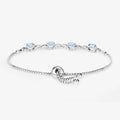 Oval Blue Aquamarine Prong Two-Tone Gold Plated Silver Infinity Bolo Adjustable Bracelet by Fine Color Jewels