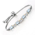 Oval Blue Aquamarine Prong Two-Tone Gold Plated Silver Infinity Bolo Adjustable Bracelet by Fine Color Jewels