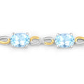 Oval Blue Topaz Prong Silver Infinity Bolo Adjustable Bracelet by Fine Color Jewels