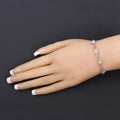 Oval Blue Topaz Prong Silver Infinity Bolo Adjustable Bracelet by Fine Color Jewels