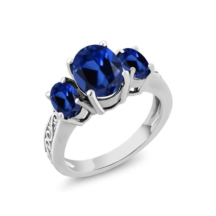Oval Cut Tri Stone Blue Topaz Ring - Assorted Sizes by DailySale