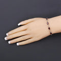 Oval Deep Red Garnet Prong Two-Tone Gold Plated Silver Infinity Bolo Adjustable Bracelet by Fine Color Jewels