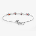 Oval Deep Red Garnet Prong Two-Tone Gold Plated Silver Infinity Bolo Adjustable Bracelet by Fine Color Jewels