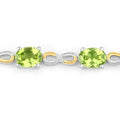 Oval Green Peridot Prong Two-Tone Gold Plated Silver Infinity Bolo Adjustable Bracelet by Fine Color Jewels