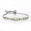 Oval Green Peridot Prong Two-Tone Gold Plated Silver Infinity Bolo Adjustable Bracelet by Fine Color Jewels