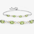 Oval Green Peridot Prong Two-Tone Gold Plated Silver Infinity Bolo Adjustable Bracelet by Fine Color Jewels