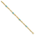 Oval Swiss Blue Topaz Bezel 10K Yellow Gold Fancy Link Bracelet by Fine Color Jewels