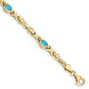 Oval Swiss Blue Topaz Bezel 10K Yellow Gold Fancy Link Bracelet