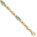 Oval Swiss Blue Topaz Bezel 10K Yellow Gold Fancy Link Bracelet by Fine Color Jewels