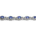 Oval Violet Tanzanite Prong Silver Halo XO Tennis Bracelet by Fine Color Jewels