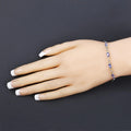 Oval Violet Tanzanite Prong Silver Infinity Bolo Adjustable Bracelet by Fine Color Jewels