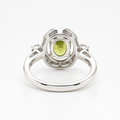 2.48 Ct Oval Green Peridot and White Topaz Prong Silver halo Engagement Ring by Fine Color Jewels