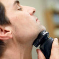 Philips Wet & Dry Shaver 5000 with SkinIQ Tech + Shave Heads, Charging & Cleaning Base (Refurbished) by DailySale