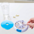 Portable Push Button Rotating Round Case Once A Day Daily Medicine Organizer by DailySale