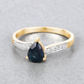 0.89ct Pear Blue Sapphire and White Diamond Prong 14K Yellow Gold Bypass Pave Band Ring by Fine Color Jewels