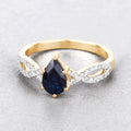 1.14ct Pear Blue Sapphire and Diamond Prong 14K Yellow Gold Crossover Engagement Ring by Fine Color Jewels