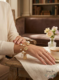 Inc Gold-Tone Imitation Pearl and Hammered Disc Shaky Charm Bracelet by Vanessa Jane