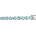 Round Swiss Blue Topaz Prong Sterling Silver Tennis Bracelet by Fine Color Jewels