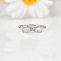 Round White Lab Diamond Pave Silver Infinity Criss Cross Ring by Fine Color Jewels