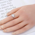 Round White Moissanite Pave Sterling Silver Four Leaf Clover Ring by Fine Color Jewels