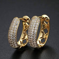 Swarovski Crystal Huggie Earrings In Yellow Gold by DailySale