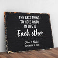 The Best Thing To Hold Onto Life Is Each Other Sign by Tailored Canvases