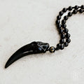 The Obsidian Wolf Pendant by Conscious Items