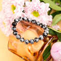 The Pattern Breaker – Snowflake Obsidian Bracelet by Conscious Items