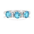 Three Stone Blue Topaz Ring by Fine Color Jewels